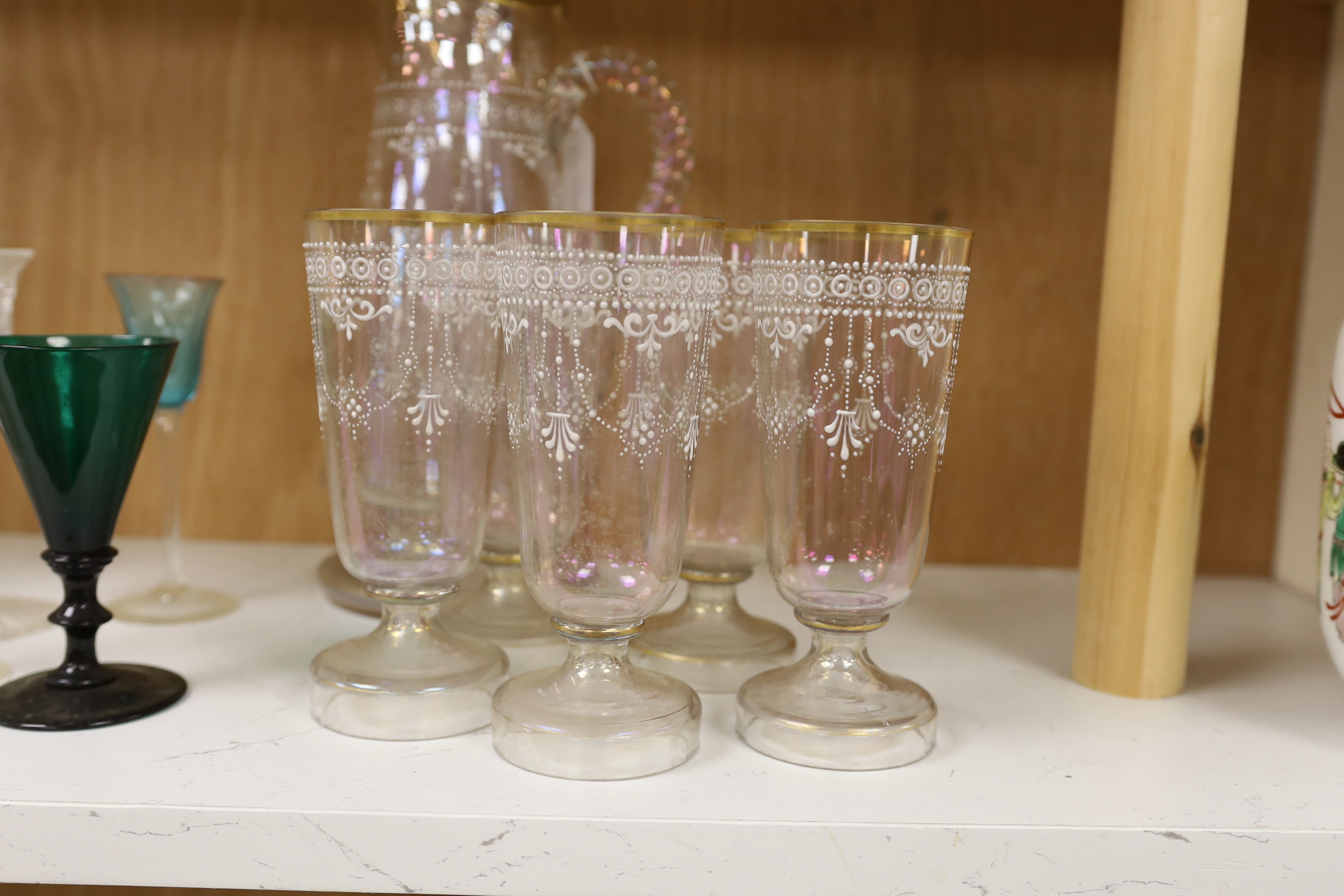 An enamelled glass lemonade set, jug 31cm, a Victorian cut glass jug with plated mounts, etc.
